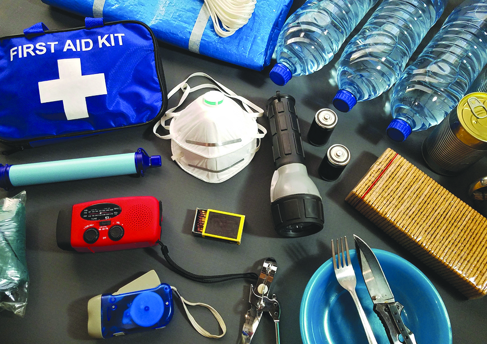 Hurricane emergency supplies including water, batteries and flashlights